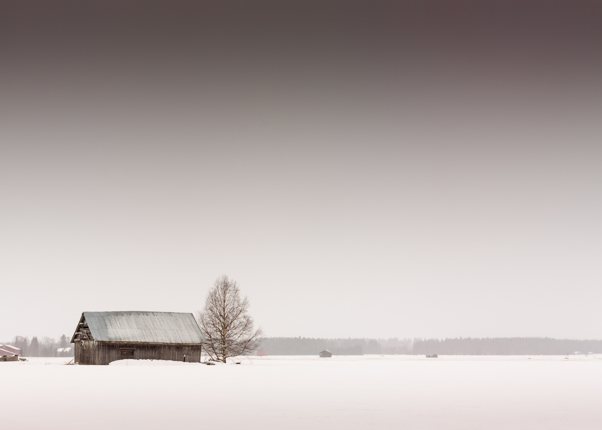 snowy field barn